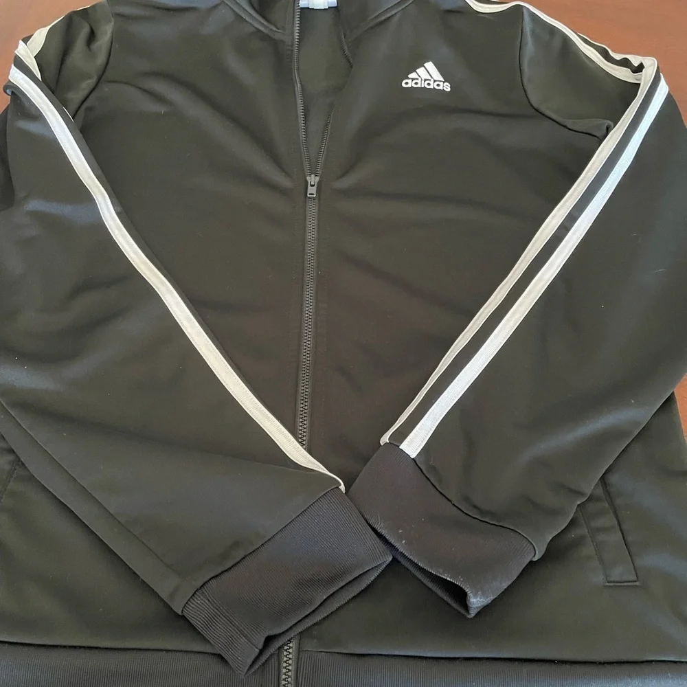 Adidas women’s ( Unisex) Black with White stripes Track Jacket size XL(18/20)